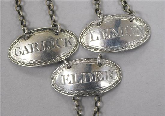 A set of 3 George III silver sauce labels; Lemon, Elder & Garlick